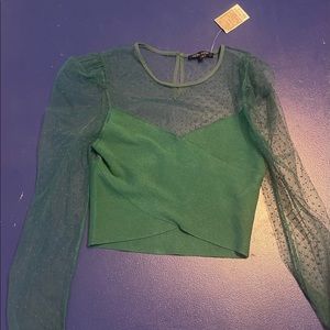 Green crop half mesh. On 12th. Brand new never worn. Size L.